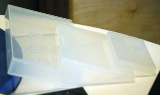 Inert plastic media containers