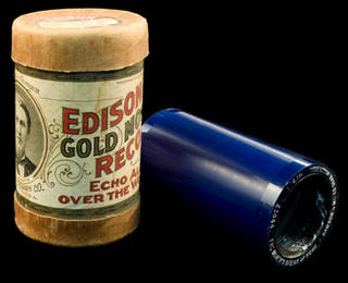 Mismatched plastic cylinder and container for a wax cylinder