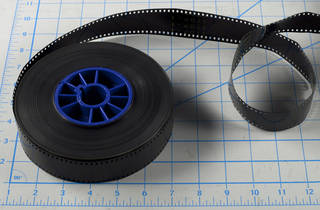 35 millimeter film pack, slightly unspooled