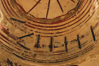 Ceramic bowl with metal staples from a previous repair