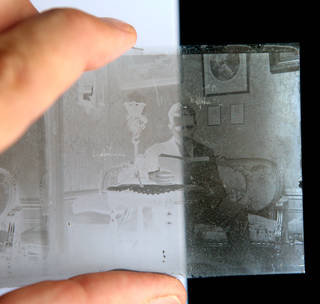 Collodion emulsion negative photographed against a black and white background