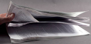 Coated paper pages blocking after water exposure