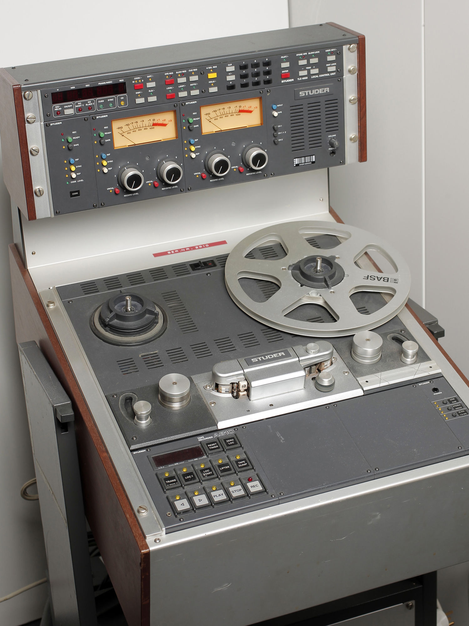 Man using a reel-to-reel audio tape recorder] - UNT Digital Library
