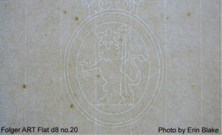 rag paper with watermark and foxing