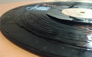 Lacquer disc delamination