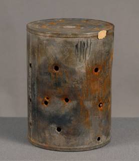 Tin artifact with deterioration