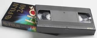 VHS cassette with manufacturer's original cardboard slip case